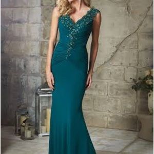 Prom/Formal MGNY Teal size 6 dress wore once. Excellent condition